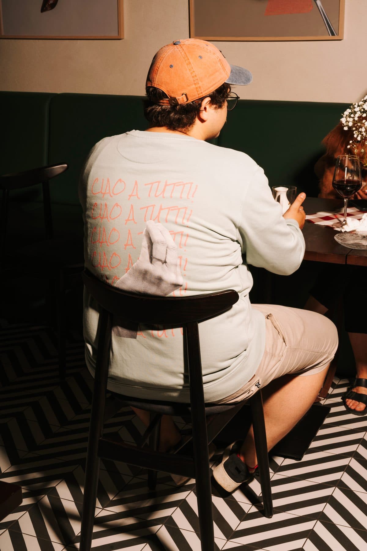 A guest enjoying a meal at PIENO
